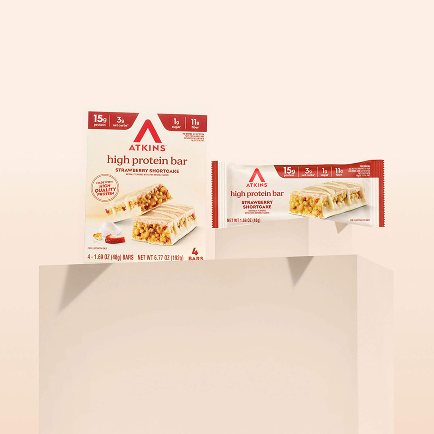 Two packages of Atkins high protein bars on a beige background